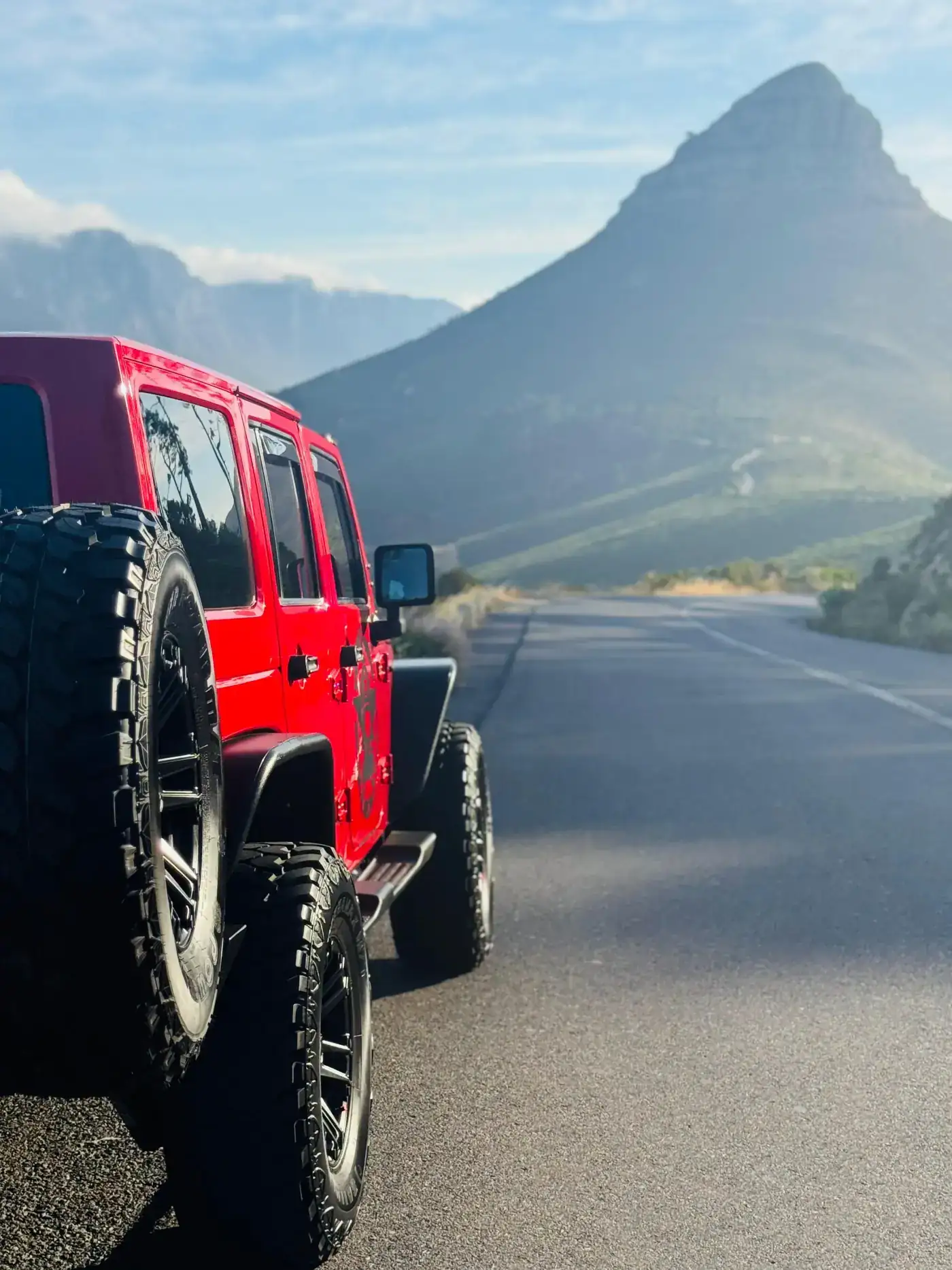Guide with red Jeep